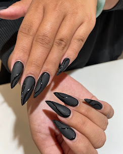 Matte black stiletto nails