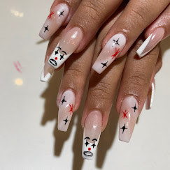 Nude coffin nails with playful face art
