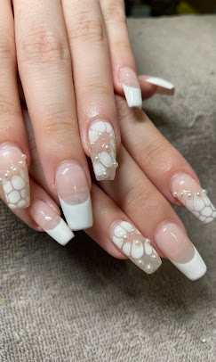 White nails with 3D floral design