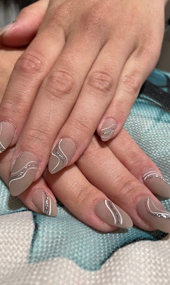 Taupe nails with silver swirl detail