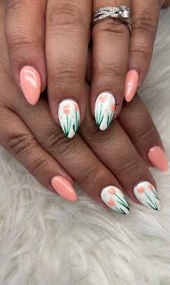 Peach nails with white tulip design
