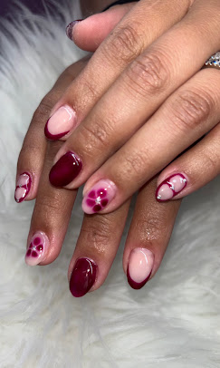 Burgundy nails with pink floral art